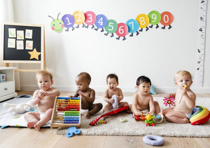 row of diverse infants
