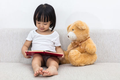 child reading book 