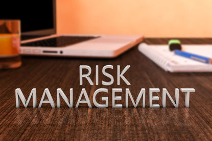 table with words risk management on it