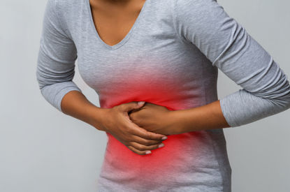 woman suffering from stomach pain