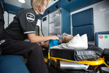 woman receiving care in ambulance